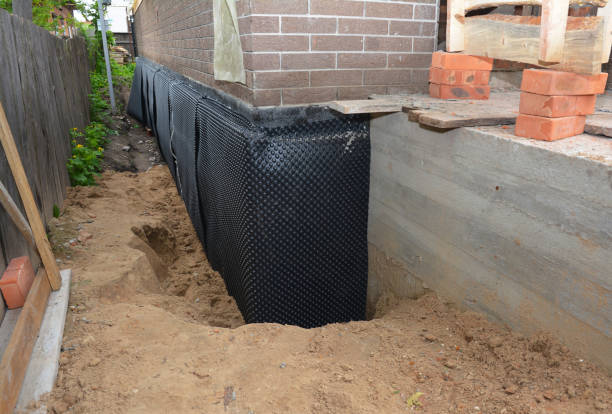 SJ Waterproofing Pros technician performing targeted Waterproofing assessment in Petersburg, KY